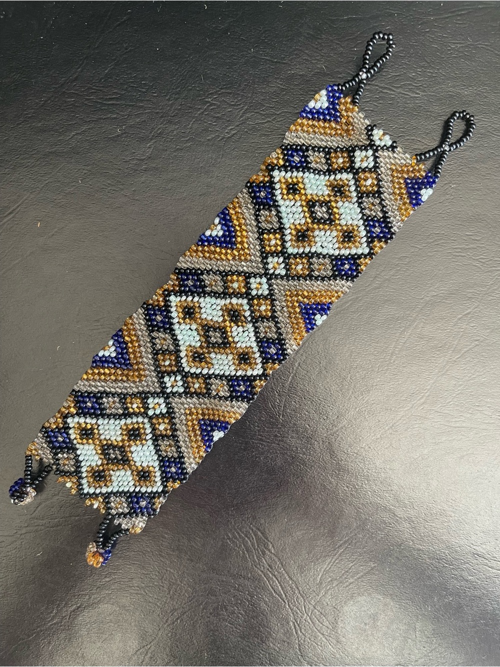 Handmade Beaded Bracelet in Blue, Gold, Black and Cream